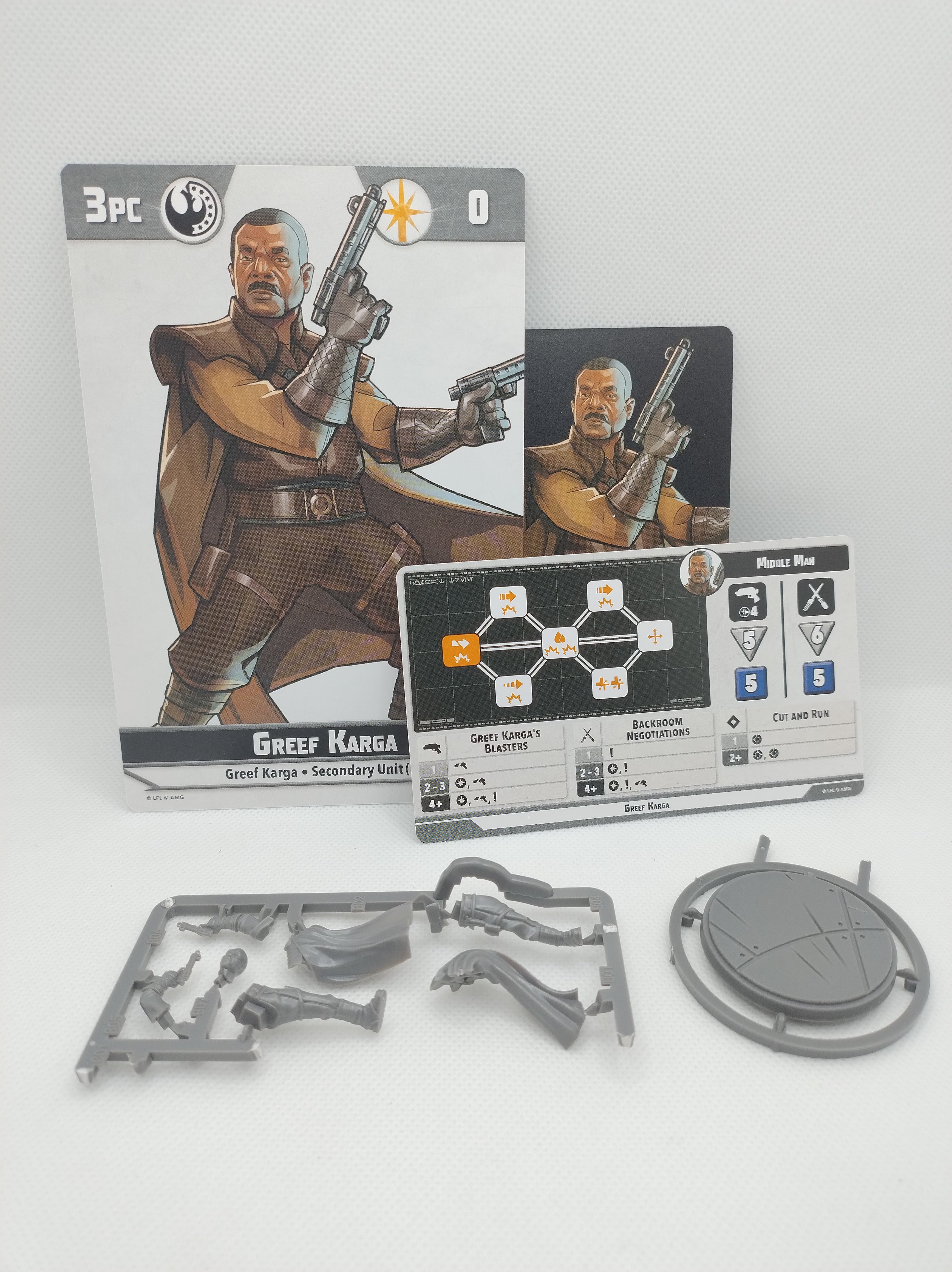 Greef Karga on sprue with cards for Star Wars Shatterpoint